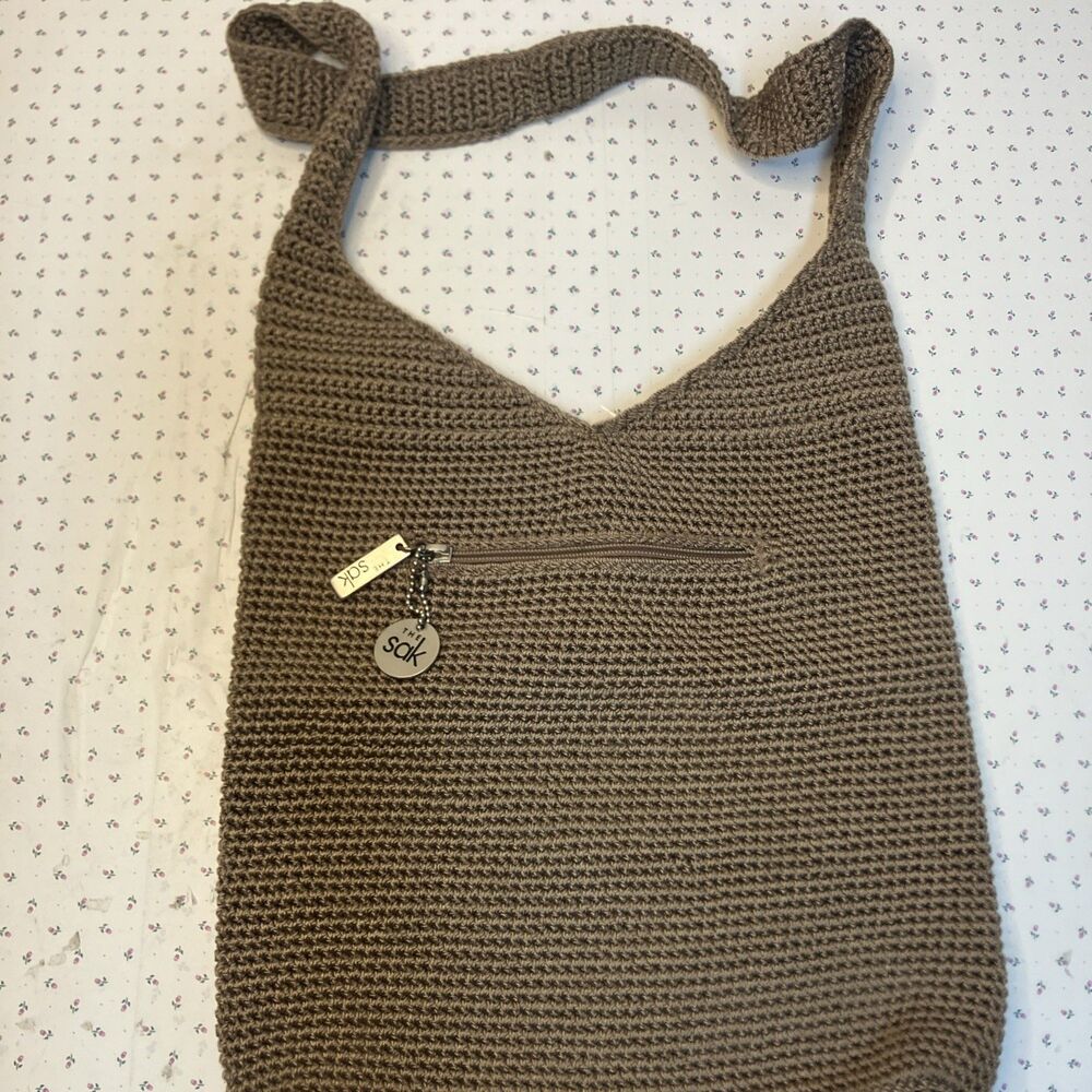 The SAK Crochet Knit Woven Shoulder Bag Purse Beige W/Charm